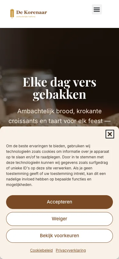 De homepage op een gsm met de cookiebanner onderaan over de volle breedte